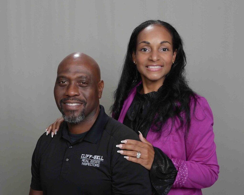 A man and woman posing for a picture.